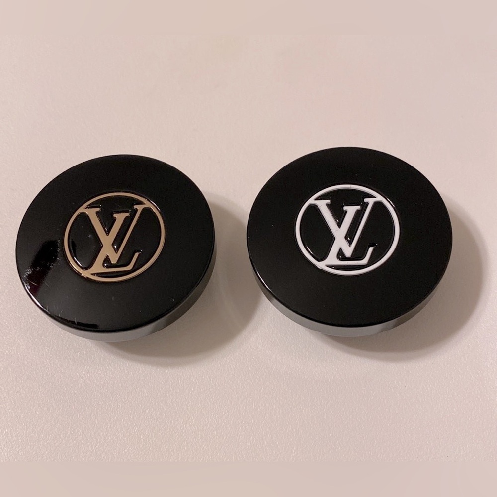 Two Louis Vuitton fragrance replacements caps